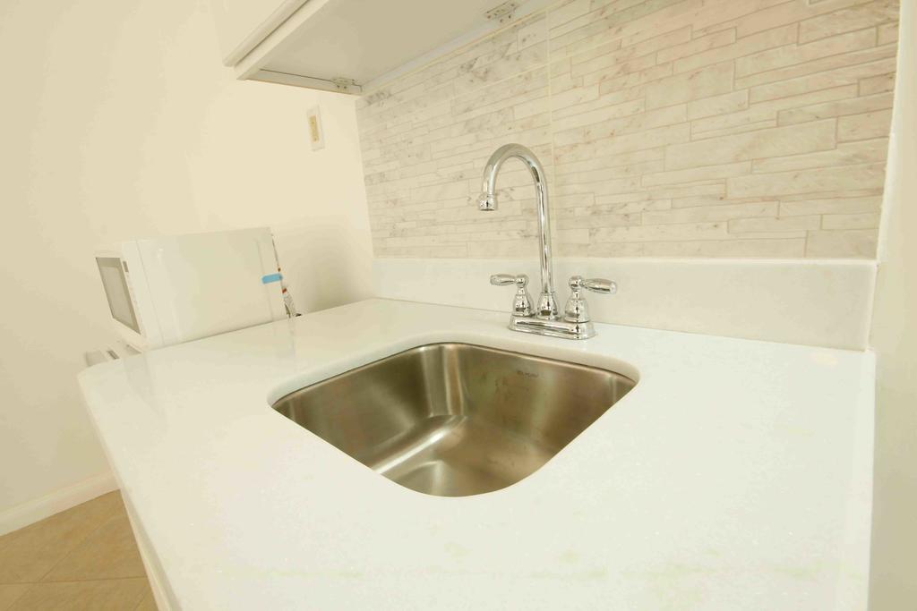 Cattleya Luxury Suites Kingston Ruang foto